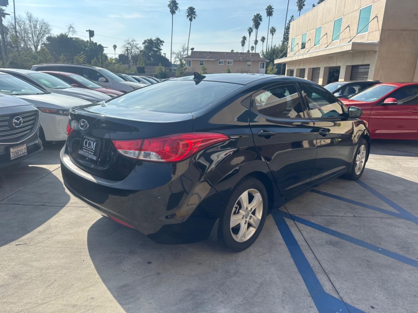 2013 Black /Black Hyundai Elantra (KMHDH4AE8DU) with an 4 Cylinder engine, Automatic transmission, located at 30 S. Berkeley Avenue, Pasadena, CA, 91107, (626) 248-7567, 34.145447, -118.109398 - Photo#4